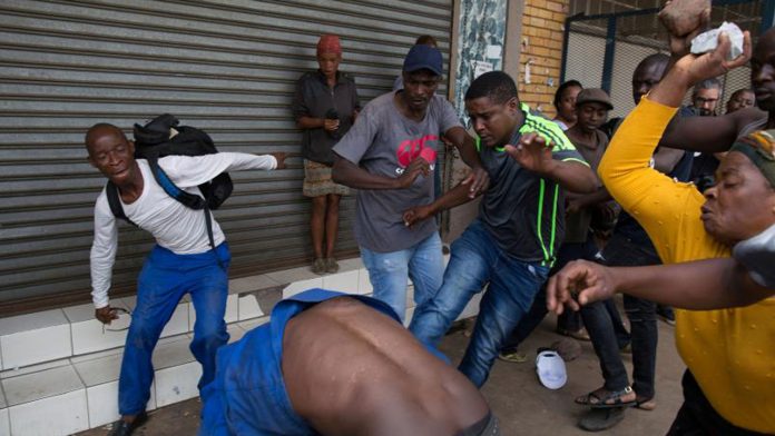 Mob Descend On Man Caught Eating Faeces In Owerri
