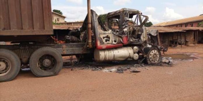 Sit-At-Home Trailer, Shop Burnt By Hoodlums In Enugu