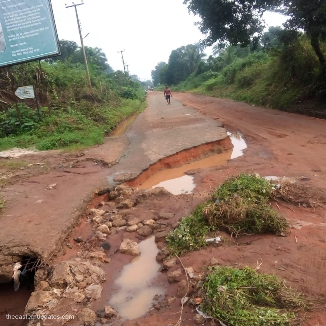 A visual representation of a deteriorating section of the Umuakura-Ubowalla Road, where erosion is visibly eating into the asphalt and rendering the thoroughfare unmotorable.