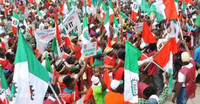A National Industrial Court ruling restrains NLC and TUC from strike action in Abuja pending a February 10 hearing.