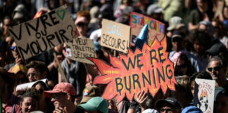 Thousands March In Geneva, Lausanne Over Climate Inaction Climate protesters march in Geneva and Lausanne